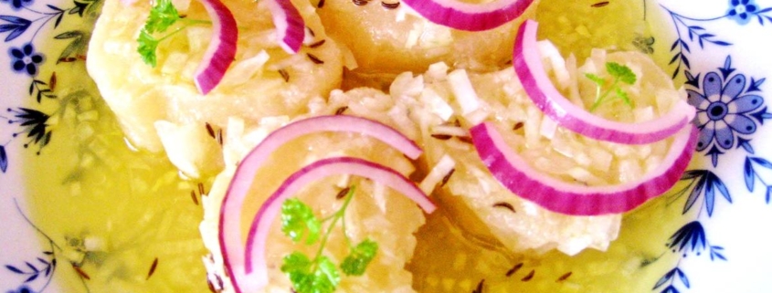 Handkäse mit Musik, also mit Essig, Kümmel und Zwiebeln